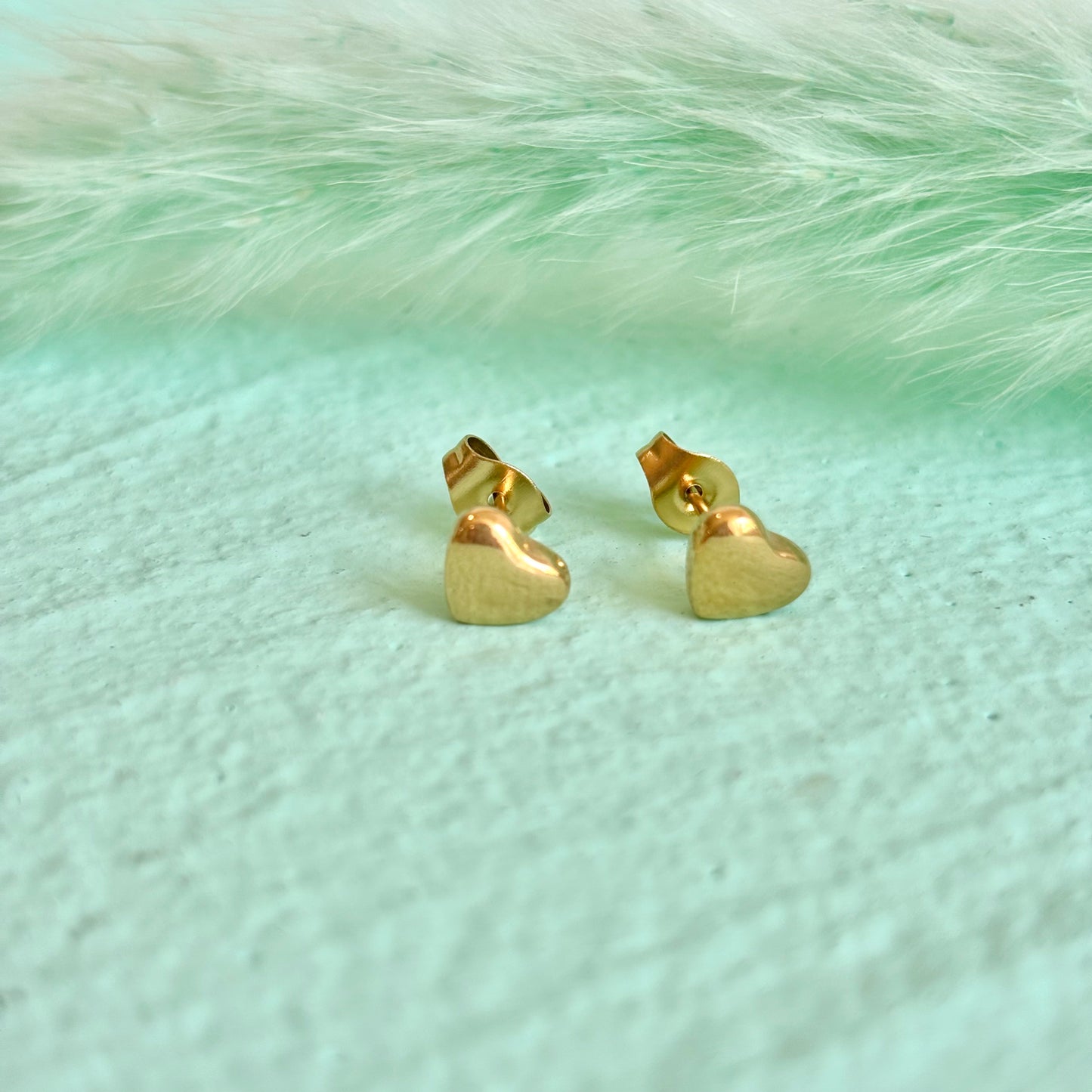 Tiny heart studs